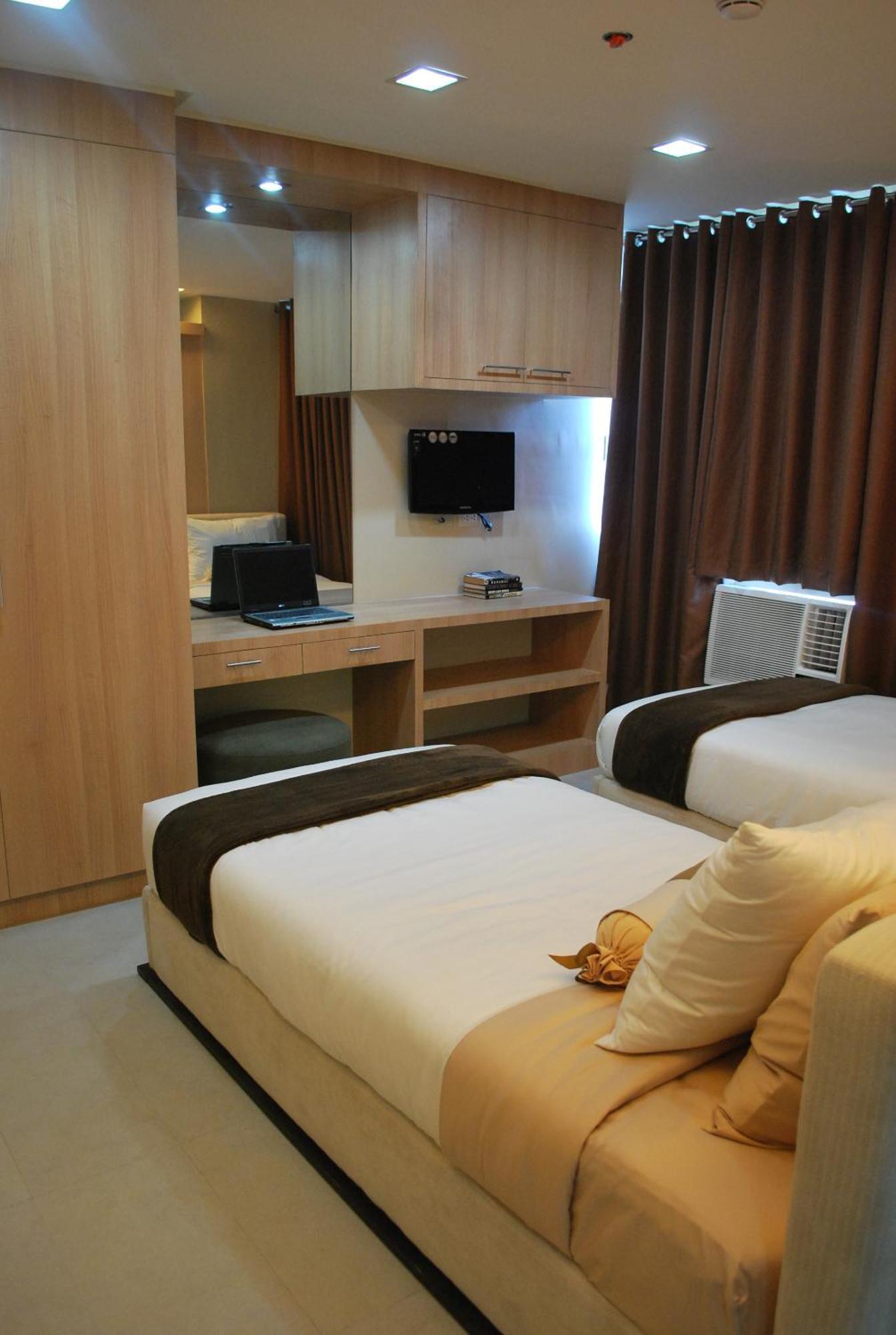 Aparthotel Bsa Twin Towers Mandaluyong Exterior foto